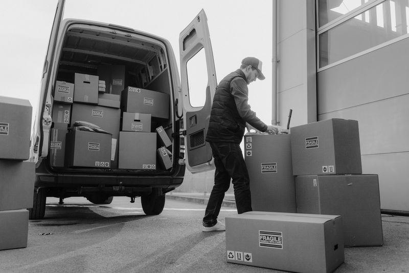 Blue Jean crew loading furniture at the truck in San Diego